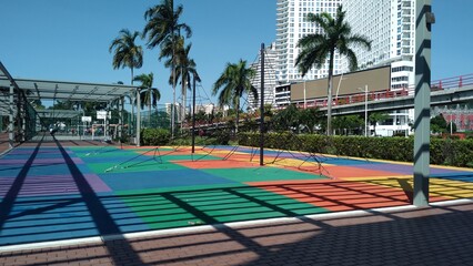 outdoor park with palm trees in Panama City, summer day