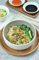 Chicken noodles with vegetables, an Indonesian delicious popular food called mie ayam