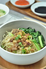 Chicken noodles with vegetables, an Indonesian delicious popular food called mie ayam