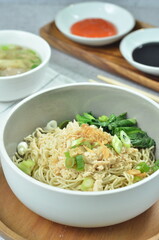Chicken noodles with vegetables, an Indonesian delicious popular food called mie ayam