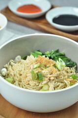 Chicken noodles with vegetables, an Indonesian delicious popular food called mie ayam