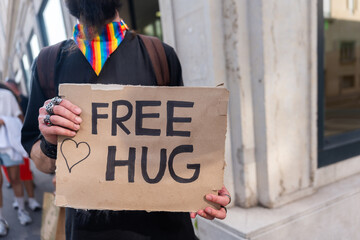 Person Holding Free Hug Sign