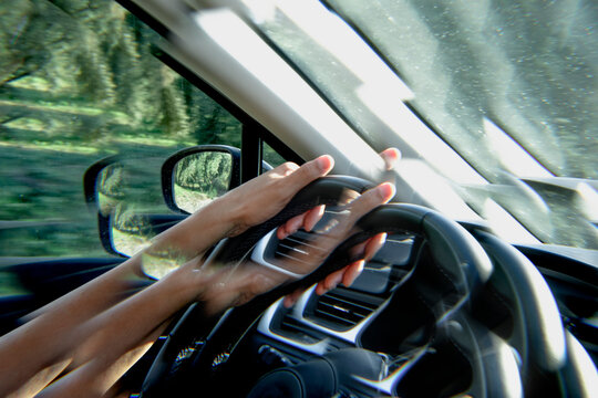 kaleidoscopic image of a man driving a car