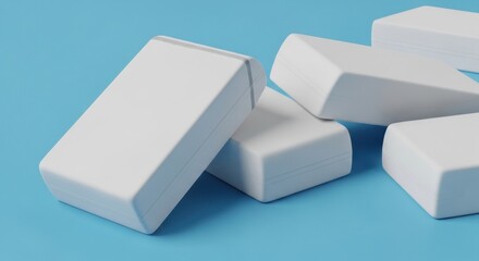 White carton packaging mockups scattered on a blue background.