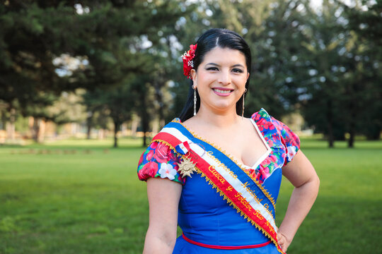 Portrait of Female Cueca Winner in Floral Traditional Dress