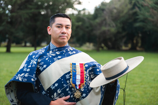 Portrait of a Cueca Champion Holding His Hat