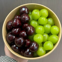 Purple and Green Mangosteen on a Plate – Exotic Fresh Fruit