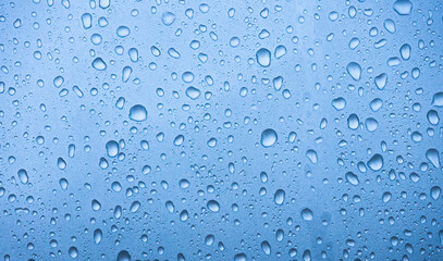 Water drops on blue background.