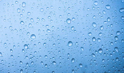 Water drops on blue background.