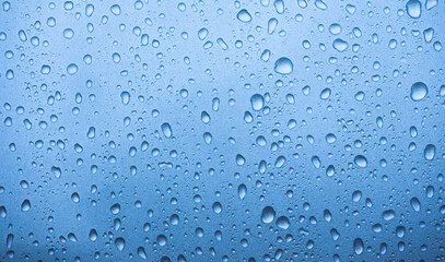 Water drops on blue background.