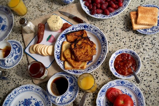 Delicious breakfast spread featuring toast fruits and coffee