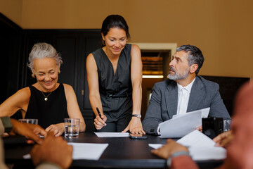 Lawyers working together on a case in office meeting room