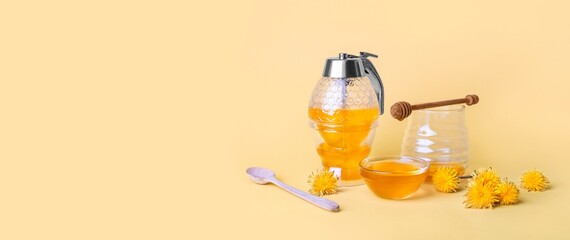 Sweet dandelion honey on beige background with space for text