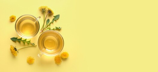 Cups of healthy dandelion tea on yellow background with space for text