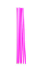 Pink plastic straws on white background