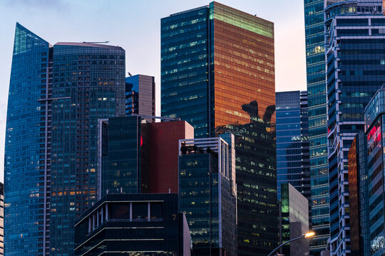 Twilight reflections on modern city glass highrises