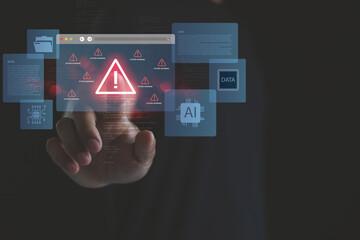Hand interacting with virtual system warning icon surrounded by AI and data graphics, illustrating cybersecurity threats, data breaches and artificial intelligence security risks in digital technology