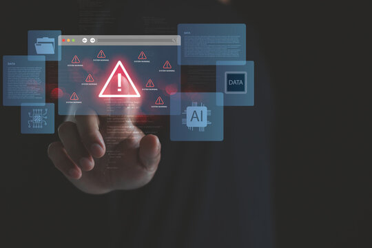 Hand interacting with virtual system warning icon surrounded by AI and data graphics, illustrating cybersecurity threats, data breaches and artificial intelligence security risks in digital technology - Powered by Adobe