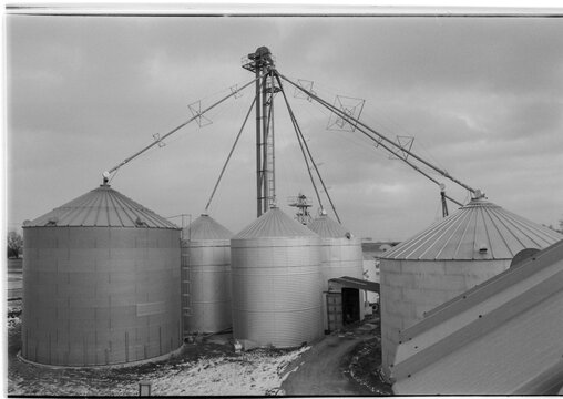 Grain Silos and Conveyor System in Winter, Shot on Film

