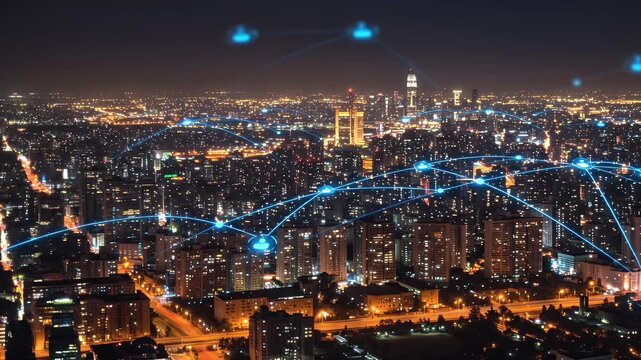 Aerial View of Illuminated Cityscape with Digital Network Overlay at Night