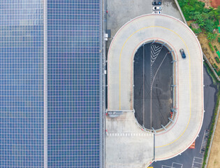 Solar Rooftop Warehouse with Spiral Vehicle Ramp System