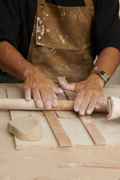 Student at pottery studio