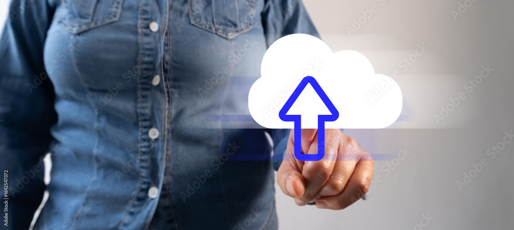 Aufkleber woman pointing at a cloud icon with an upward facing date to upload documents
