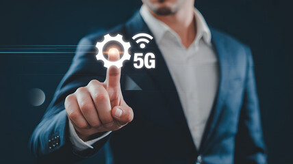 Businessman activates 5G technology interface for seamless connectivity and innovation