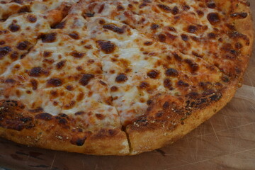 Cheese pizza with garlic crust