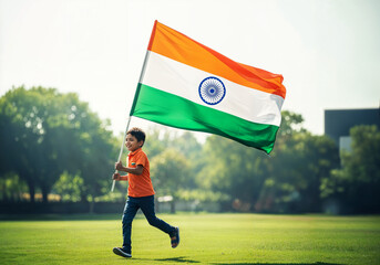 Youth sprinting with Indian national flag at sunrise