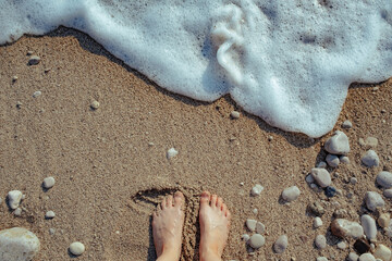 Enjoying the gentle ocean waves on a sandy beach