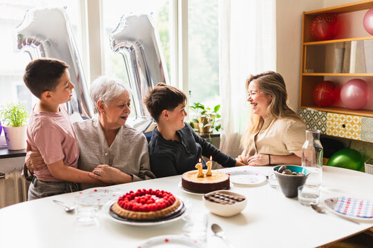 Happy Family Celebrating 11th Birthday Together at Home