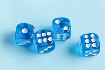 Blue game dices on color background