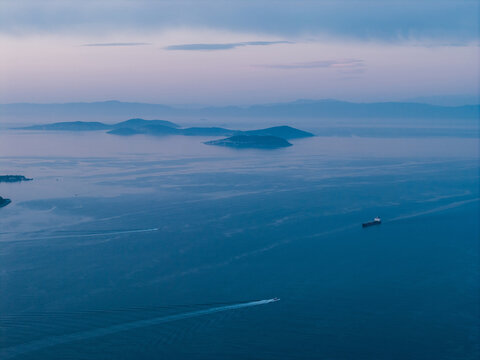 Aerial view of Adalar islands with boat and cargo ship