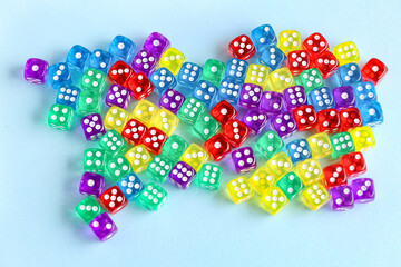 Colorful game dices on blue background