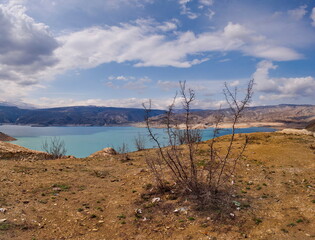 Dubki, Russia. April 03, 2021. Scenic view of the reservoir on the Sulak River in the mountains of the North Caucasus.