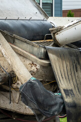 Cement mixer truck and cement pumper truck set up to feed fresh cement to boom arm to pump fresh concrete in new housing development house construction project
