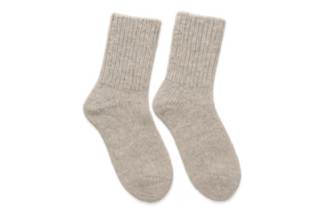 Pair of beige cozy wool socks isolated on transparent background