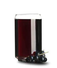 Glass of fresh black currant juice and berries on white background