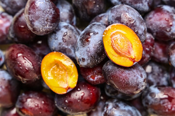 Texture of fresh ripe plums as background