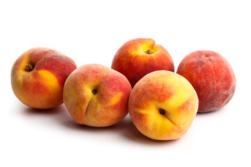 Many sweet ripe peaches on white background