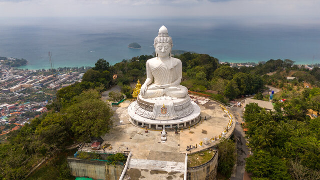 Big Buddha Statue with City and Sea