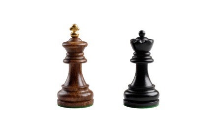 King and Queen Chess Pieces: A studio shot of a regal chess King and a powerful Queen, captured in a game of strategy.