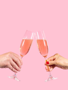 Woman and Man Toasting  Pink Champagne 