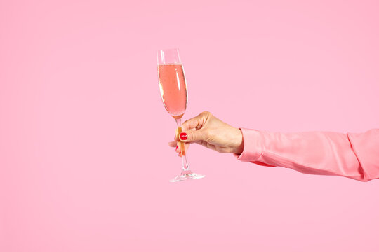 Woman Holding Pink Champagne 