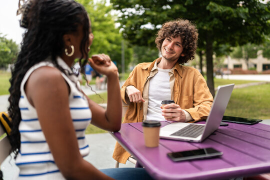 University students relaxing at campus cafe