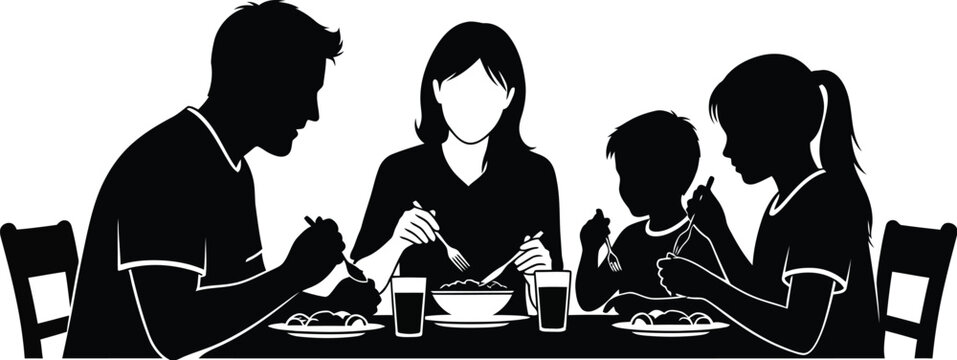 A family is sitting around a table, eating dinner together and enjoying each others company in their home