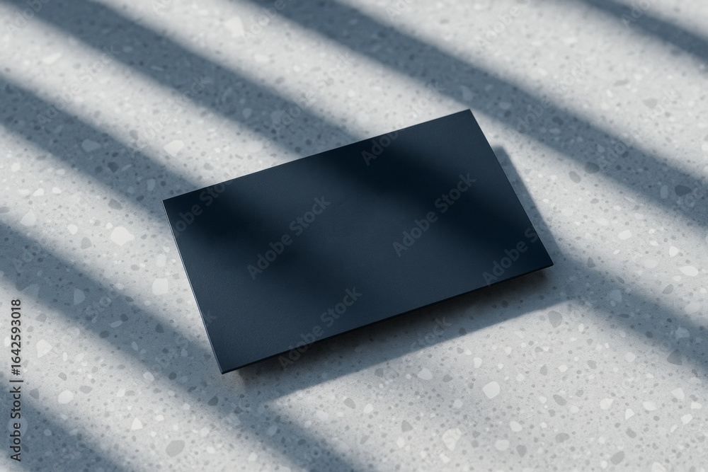 Aufkleber black business card mockup on terrazzo background with soft sunlight shadows, perfect for branding o