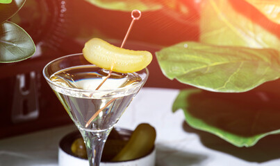Cajun Martini alcoholic cocktail drink with vodka, jalapeno pepper, dry vermouth and pickle