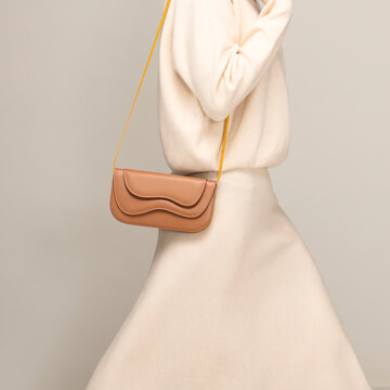 Stylish Beige Outfit With Minimalist Tan Handbag Accessory
